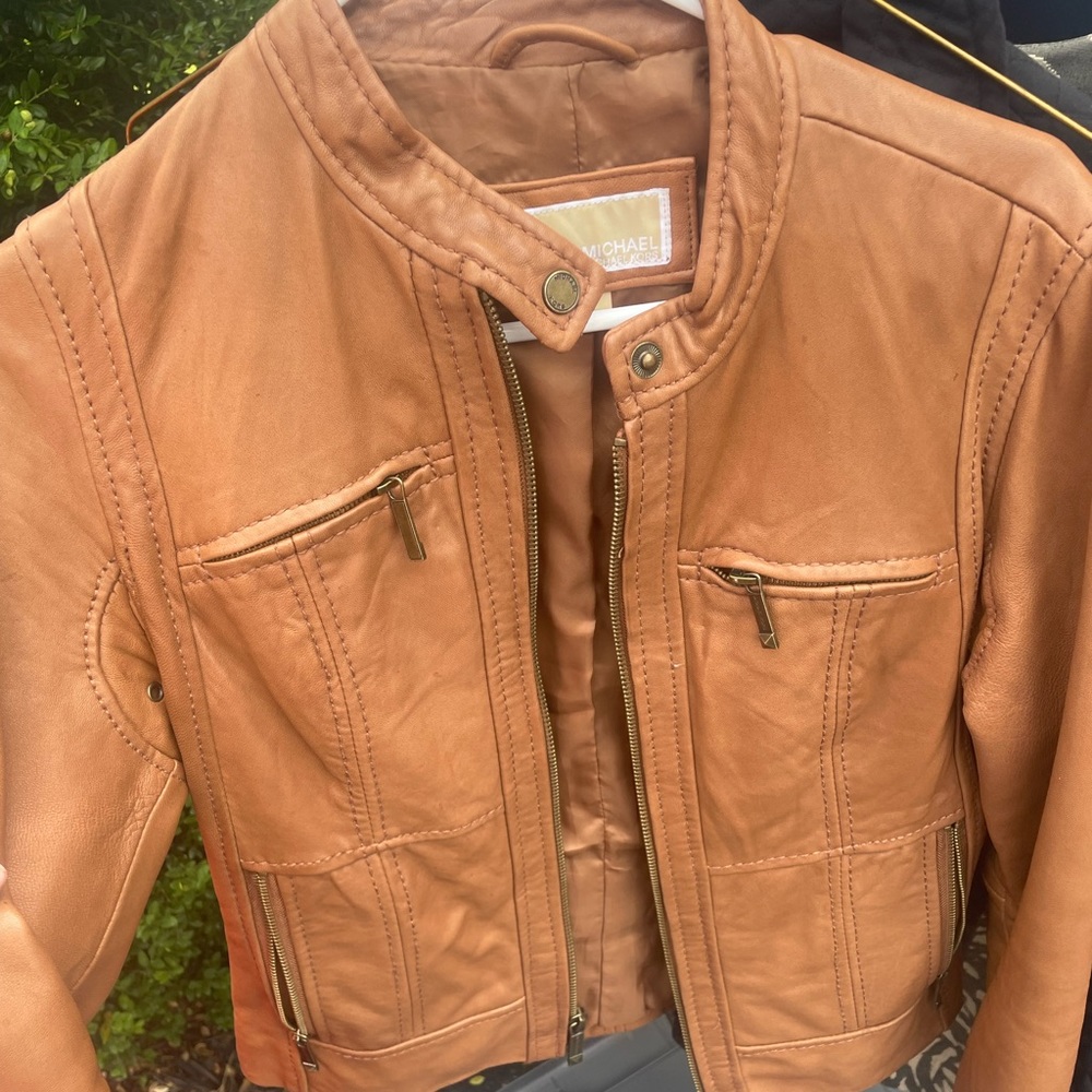 Tan leather jacket in excellent condition!